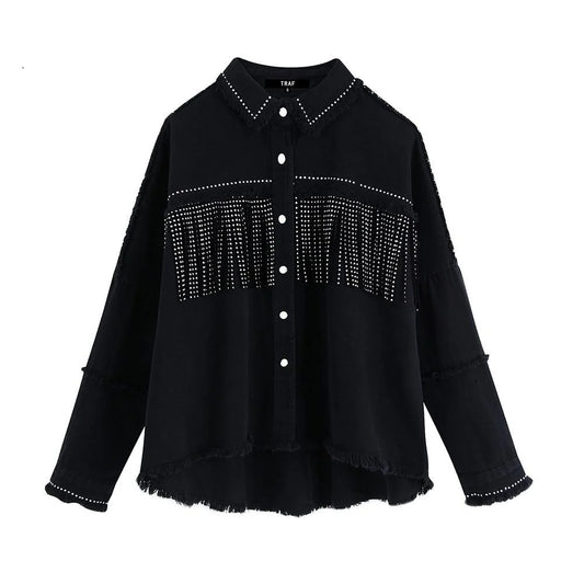 Chaqueta vaquera con borlas y abalorios