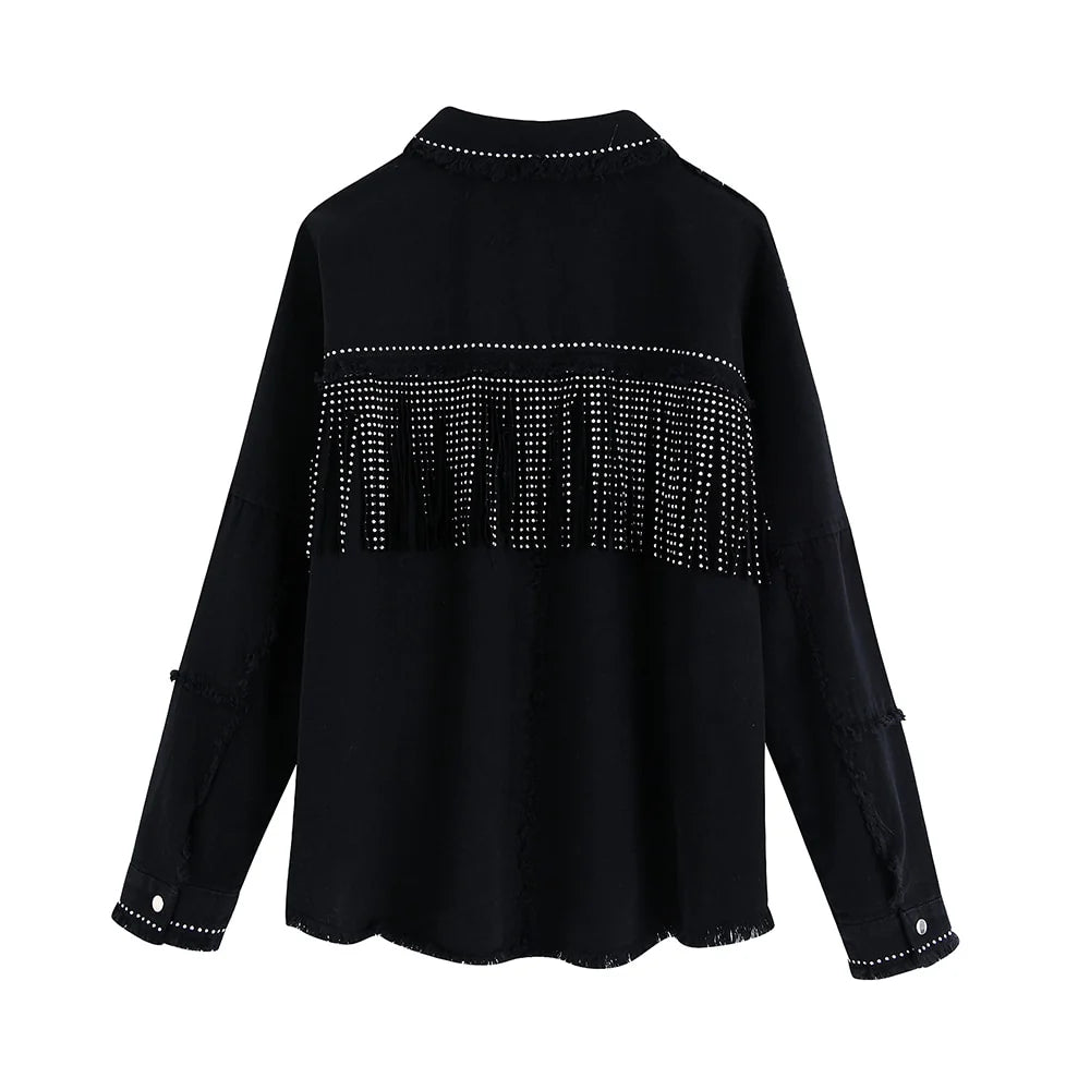 Chaqueta vaquera con borlas y abalorios